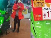 Mujer se encadena a motocicleta para que se la vendan a 14 pesos (75 centavos de Dólar)