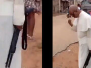 Tras ola de violencia en Nigeria, sacerdote oficia misa armado con escopeta